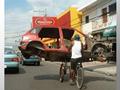 car on cycle.. russin funny pictures
