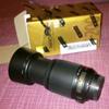 55-200mm Nikor lens. just box open used one. brand new almost. in warranty.
