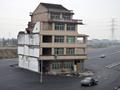 Motorway Built Around Couples Home In China.