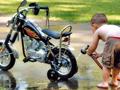 funny baby cleaning bike