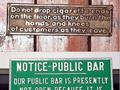 Signs on Exit of a Public Bar